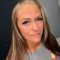 Client selfie after eyelash extensions at Fairy Lashes & Brows, Nederland TX